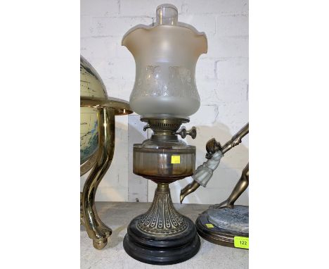 A Victorian style oil lamp with slice cut glass reservoir 21" overall 