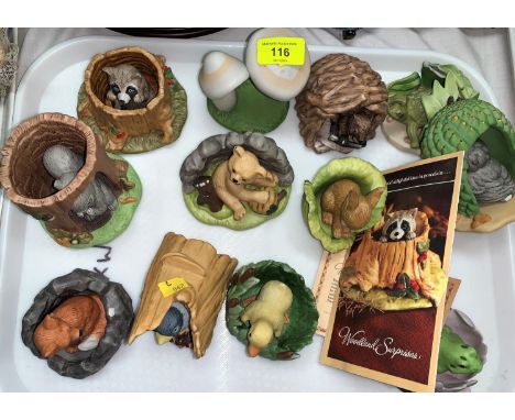 A collection of colour bisque models "Woodland Surprises" and 7 various miniature dolls