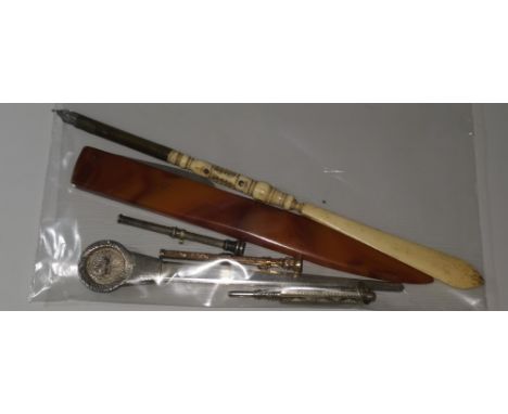 2 Edwardian geometric set propelling pencils; a carved bone dip pen with Stanhope lens, a Caithness letter opener etc 