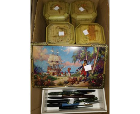 A selection of vintage fountain pens and vintage tins 