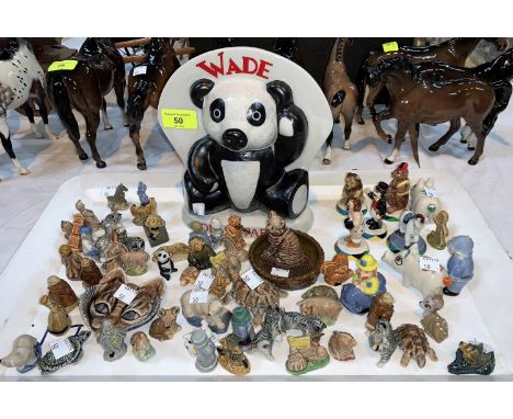 A Wade Collectables free standing ceramic sign &amp; a large selection of Wade Whimsies boxed and unboxed 