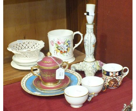 A Continental puce and gilt decorated two-handled pot with cover, on stand, 14cm high, a ceramic floral decorated and encrust