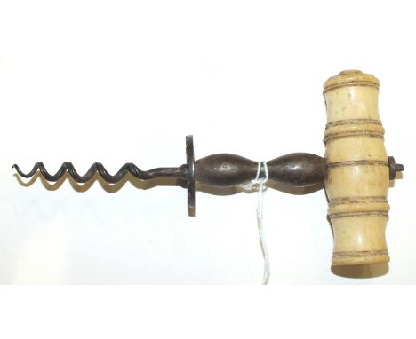 A 19th century ivory-handled corkscrew, 16.5cm long, (brush lacking).