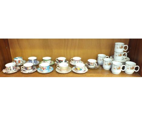 Eleven Royal Worcester miniature cabinet cups and saucers and a set of six each Chinese cups and saucers.