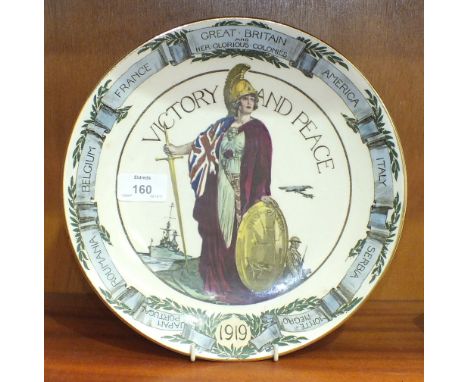 A Royal Doulton "Great Britain and Her Glorious Colonies, Victory and Peace" 1919 plate, 26cm diameter and two "Black & White