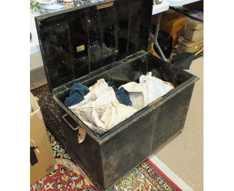 A quantity of table linen, etc. and a metal trunk.