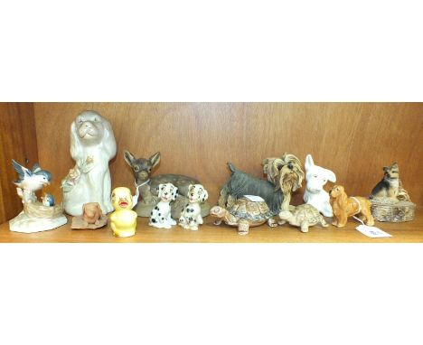 A Royal Worcester Cocker Spaniel no.2944, 5.8cm high, a Poole Pottery model of a fawn, 10cm high and other animal ornaments.