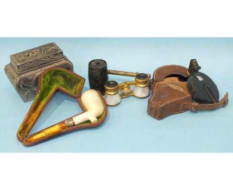 A black lacquered prismatic compass in leather case, a pair of gilt and mother-of-pearl opera glasses marked 'Iris, Paris' an