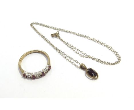 A 9ct gold ruby and diamond chip half hoop ring, size O and a garnet pendant hung on 9ct gold chain, 2.9g