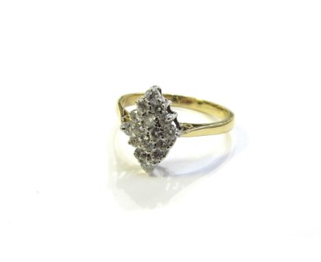 An 18ct gold marquise shape diamond cluster ring. Size R, 3.4g