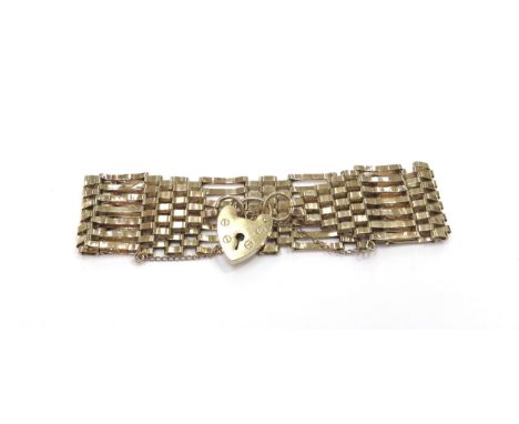 A 9ct gold seven gate bracelet, 18cm long