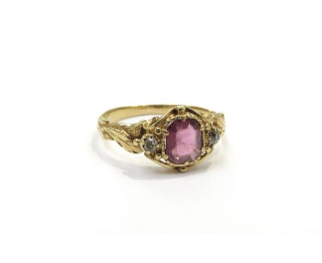 A 19th Century ruby and diamond ring with acanthus leaf decoration to shoulder, unmarked. Size K, 2.4g