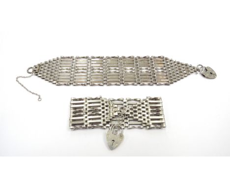 Two silver wide gate bracelets