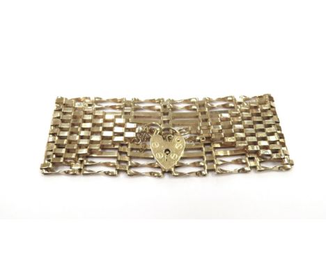 A 9ct gold ten bar gate bracelet, 17cm long