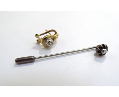 A stick pin set with an old cut diamond and a single 18ct gold earring with single diamond (2.1g earring)