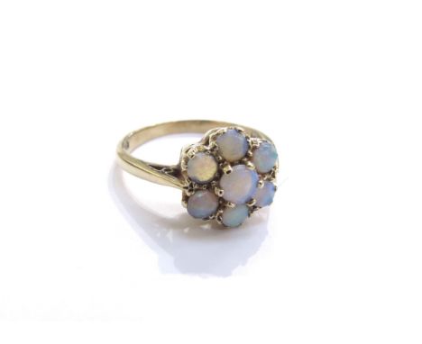 A 9ct gold opal cluster ring. Size O/P, 2.6g