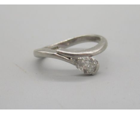 Platinum diamond solitaire ring, the pear cut diamond set with twist setting, stamped 950, size J, 5.00gShipping £20.00 plus 