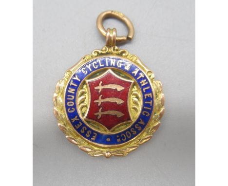 9ct yellow gold and enamel Essex Country Cycling & Athletic Association fob, stamped 375, 7.64gShipping £20.00 plus vat (UK O