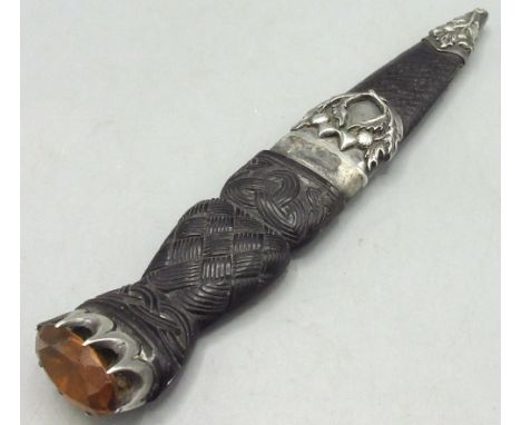 Scottish Skean Dhu, three inch blade, handle with weave grip & Celtic knot detail, set with orange stoneShipping £33.00 plus 