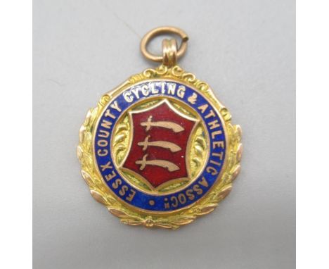 9ct yellow gold and enamel Essex Country Cycling & Athletic Association fob, stamped 375, 7.64gShipping £20.00 plus vat (UK O