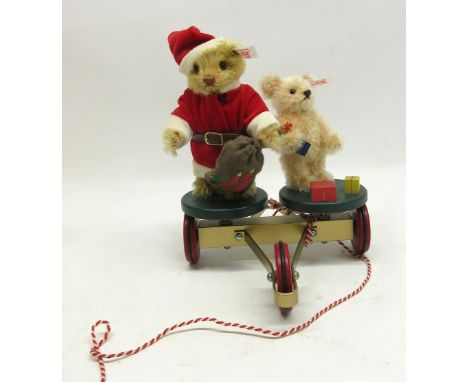 Steiff 'Rolly Drolly Pull Wagon', No. 00005, limited edition of 1500, with box, H22cmShipping £38.00 plus vat (UK Only)