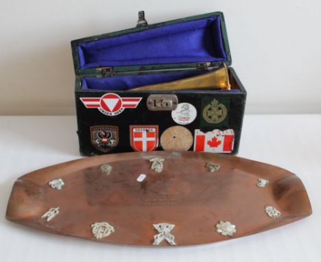 British military bugle complete with wooden carrying case, together with copper award plate adorned with military cap badges.