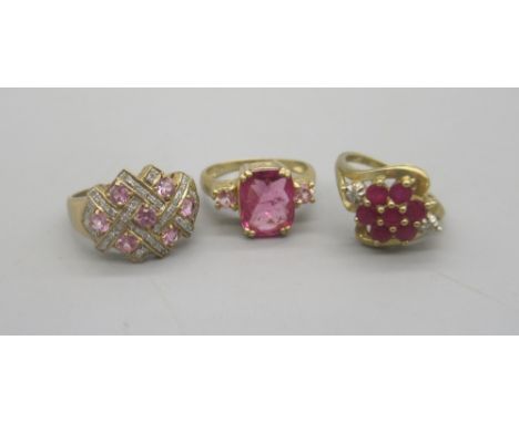 9ct yellow gold floral cluster ring set with rubies and diamonds, size K, a 9ct gold pink sapphire and pave set diamond ring,