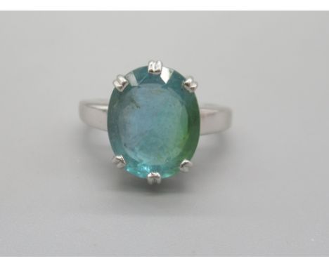 18ct white gold cocktail ring set with large blue/green stone, stamped 750, size N 1/2, 5.92gShipping £20.00 plus vat (UK Onl