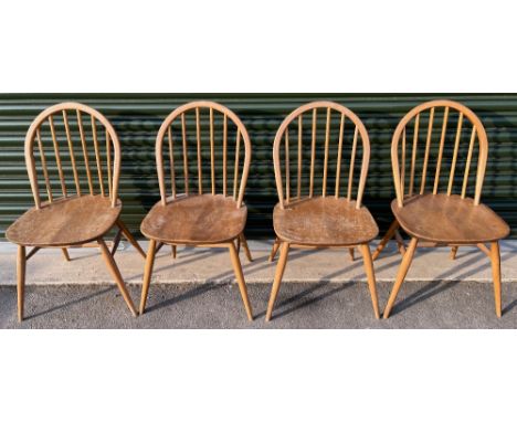 Set of four Ercol light/natural finish Windsor hoop spindle back dining chairs, H82cmShipping POA  https://www.bradleys.ltd/q