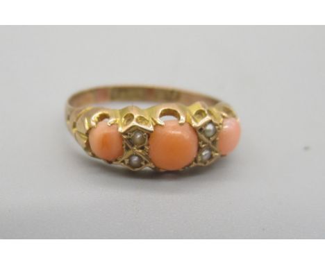 9ct yellow gold ring set with coral and seed pearl, stamped 375, size N, 1.39gShipping £20.00 plus vat (UK Only)