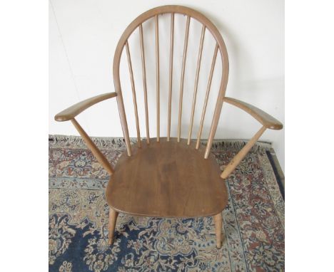 Ercol light elm hoop and stick back armchair, W70cm D53cm H83cmShipping POA https://www.bradleys.ltd/quotation-request-form