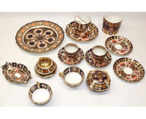 Collection of Imari decorated porcelain, incl. a Davenport moustache cup and saucer, Royal Crown Derby table lighter, trinket