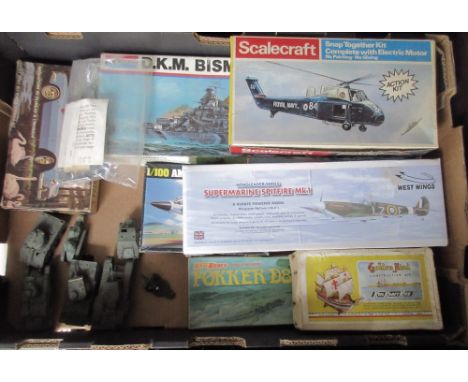 Eight various unmade model kits incl. Wingleader Spitfire Monogram Bismark, Aurora Triumph Spitfire and seven made up militar