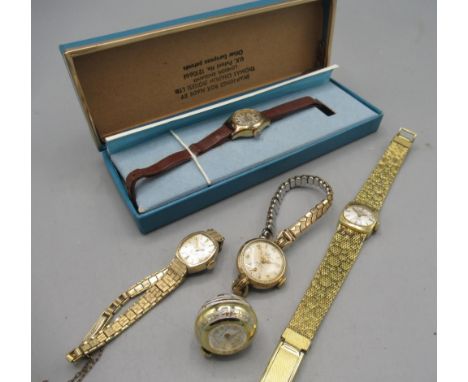 Smiths De Luxe lady's gold plated wristwatch on gold plated expanding bracelet, signed silvered dial with Arabic and baton in