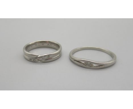 Platinum double band twist ring set with small brilliant cut diamonds, size L1/2, and another platinum ring set with a small 