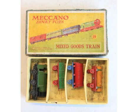 Vintage pre-war Meccano Dinky Toys Mixed Goods Train set with 0-6-0 tank locomotive and 3 goods wagons, models in generally g
