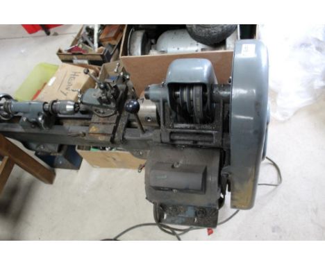 Myford ML7 metal working lathe with operating instructions and collection of accessories including a large quantity of turnin