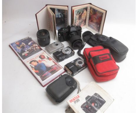 Pentax P30 35mm camera with Sigma 1:2.8~4 f=35~70mm lens; other film cameras; digital cameras and three albums of film relate