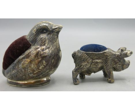 20th century silver pin cushion in the form of a pig, stamped 925, and a 20th century silver pin cushion in the form of chick
