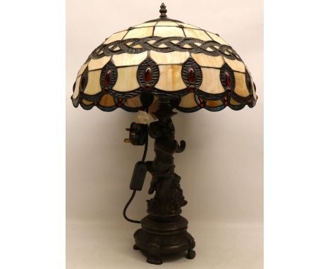 Tiffany style lamp on a stylized putti base, H55cmShipping £68.00 plus vat (UK Only)
