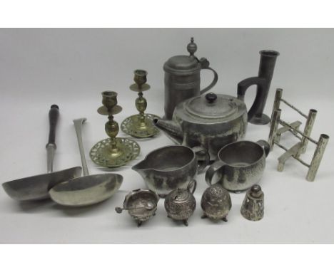 Liberty & Co., London, Tudric pewter hand hammered three piece teaset, comprising two pint teapot, milk jug and sugar basin, 