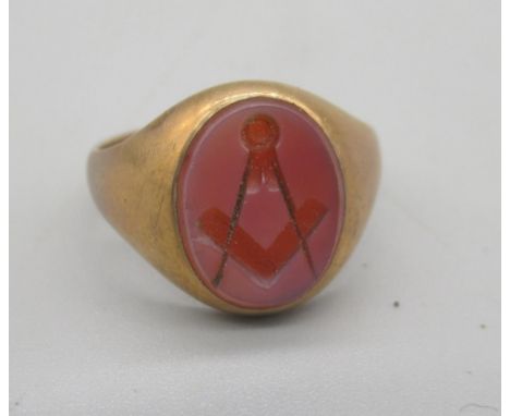 9ct yellow gold Masonic signet ring with carnelian with square and compass, 3.82gShipping £20.00 plus vat (UK Only)