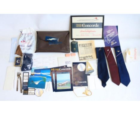 Concorde 1978 passenger gift bag with various items including soap, aftershave lotion, flight guides, writing paper and envel