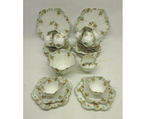 Wileman Foley China thirty eight piece fluted hand painted teaset with gilt highlights, Rd. 208329Shipping £48.00 plus vat (U