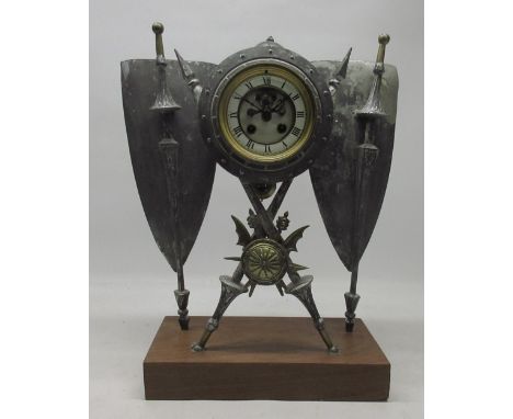 French drum head mantle clock, military inspired alloy case set with two crossed lances flanked with two shields, 4" stepped 