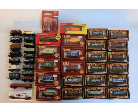 Collection of OO gauge model railway wagons from Airfix, Mainline and Hornby including 23 boxed examples (boxed model conditi