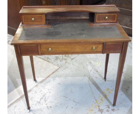 Batchelar & Son Ltd. Croydon - Edwardian inlaid mahogany writing table, with raised back, inset writing surface and frieze dr