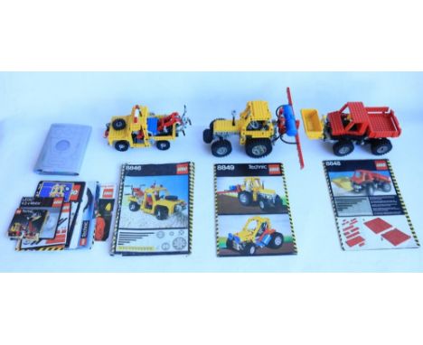 Three medium size vintage Circa early 1980's Lego Technic sets, all complete and with original instructions to include 8846, 