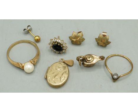 9ct yellow gold jewellery including a ring set with single pearl, size O, a pair of leaf shaped stud earrings, a pendant lock
