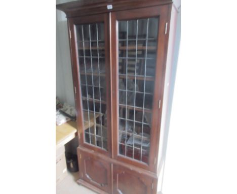 Georgian mahogany secretaire bookcase, two astragal glazed doors above fitted drawer and two doors, on bracket feet, W124cm D